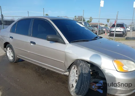 2001 Honda Civic Lx z USA, uszkodzony, nr VIN JHMES16571S007895